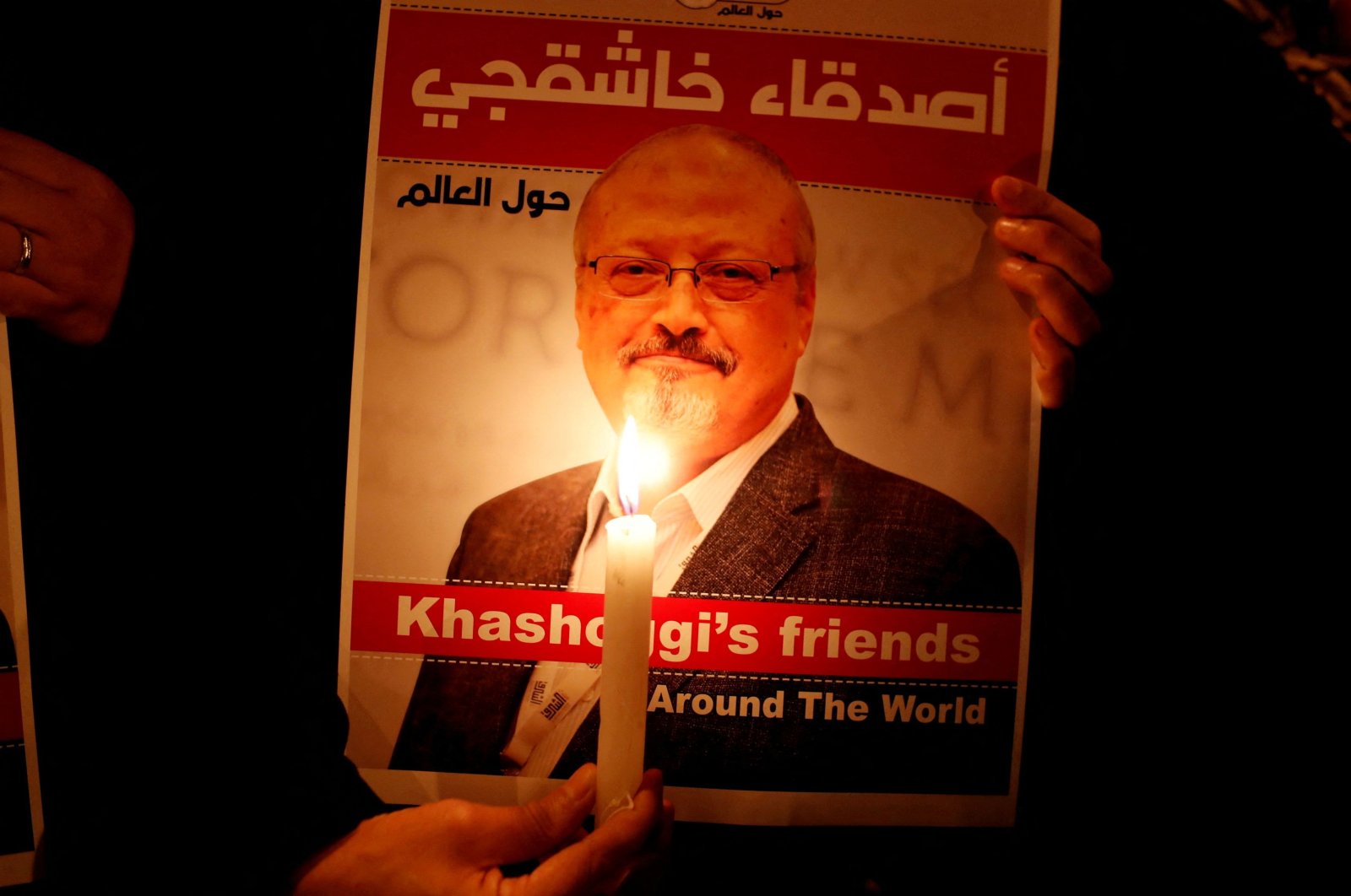 A demonstrator holds a poster with a picture of Saudi journalist Jamal Khashoggi outside the Saudi Arabia consulate in Istanbul, Turkey, Oct. 25, 2018. (REUTERS)