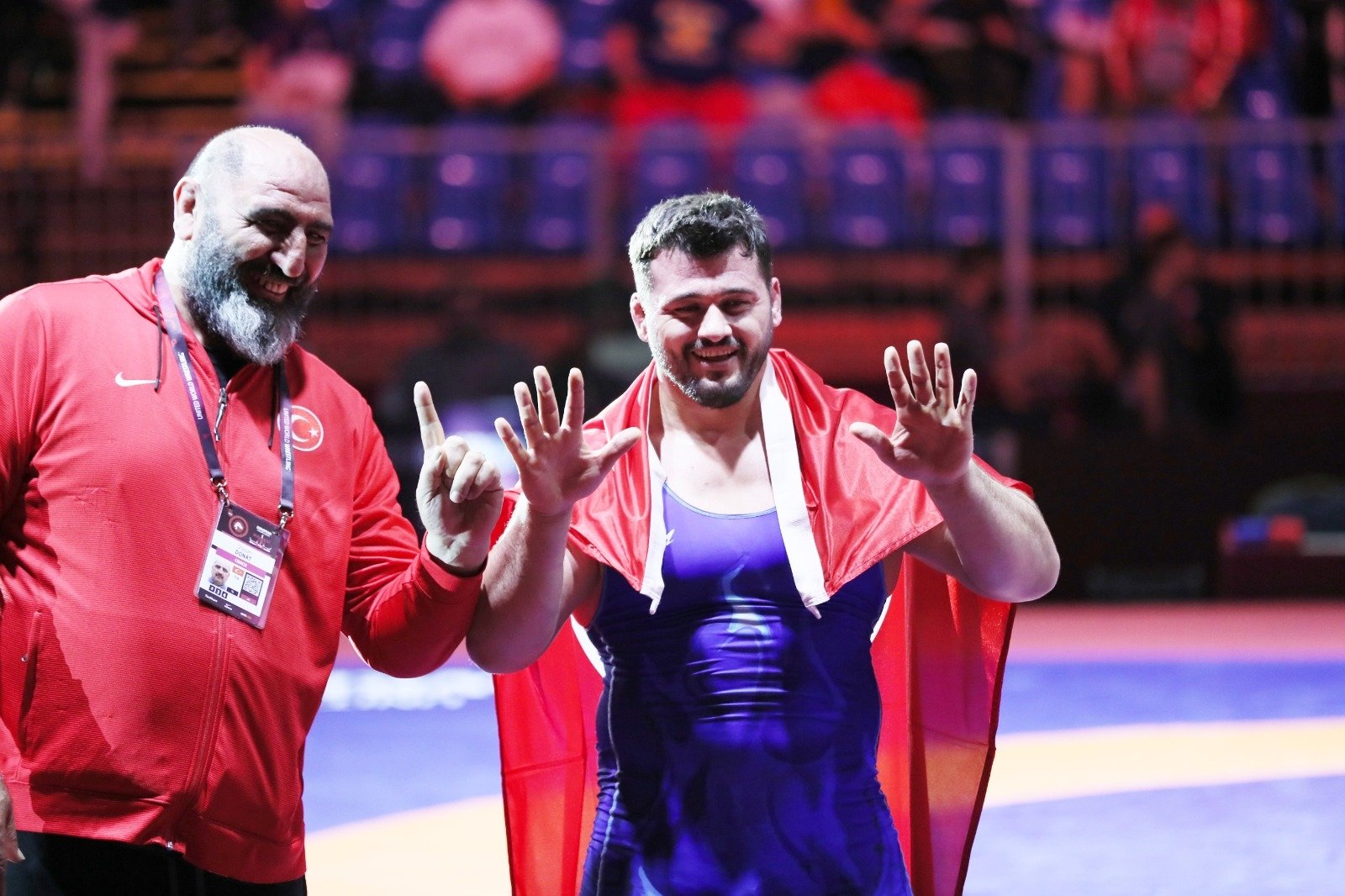 Turkish wrestler Rıza Kayaalp and a team member celebrate his 11th gold medal in the European Wrestling Championships in Budapest, Hungary, April 2, 2022. (DHA Photo)