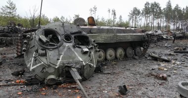 The letter V, the Russian forces emblem, is seen on a blown Russian tank turret in the village of Dmytrivka close to Kyiv, Ukraine, Saturday, April 2, 2022. (AP Photo)