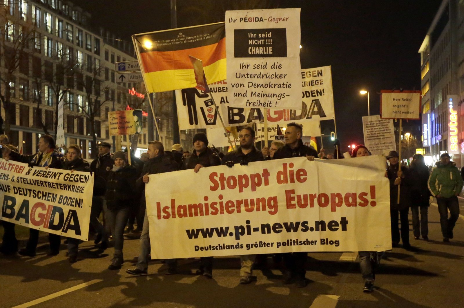 Participants of BAGIDA, the Bavarian section of the anti-immigration and Islamophobic far-right movement PEGIDA, gather in Munich, Germany, Jan. 19, 2015. (AP Photo)