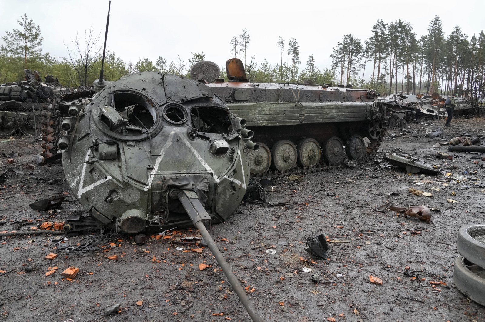 The letter V, the Russian forces emblem, is seen on a blown Russian tank turret in the village of Dmytrivka close to Kyiv, Ukraine, Saturday, April 2, 2022. (AP Photo)