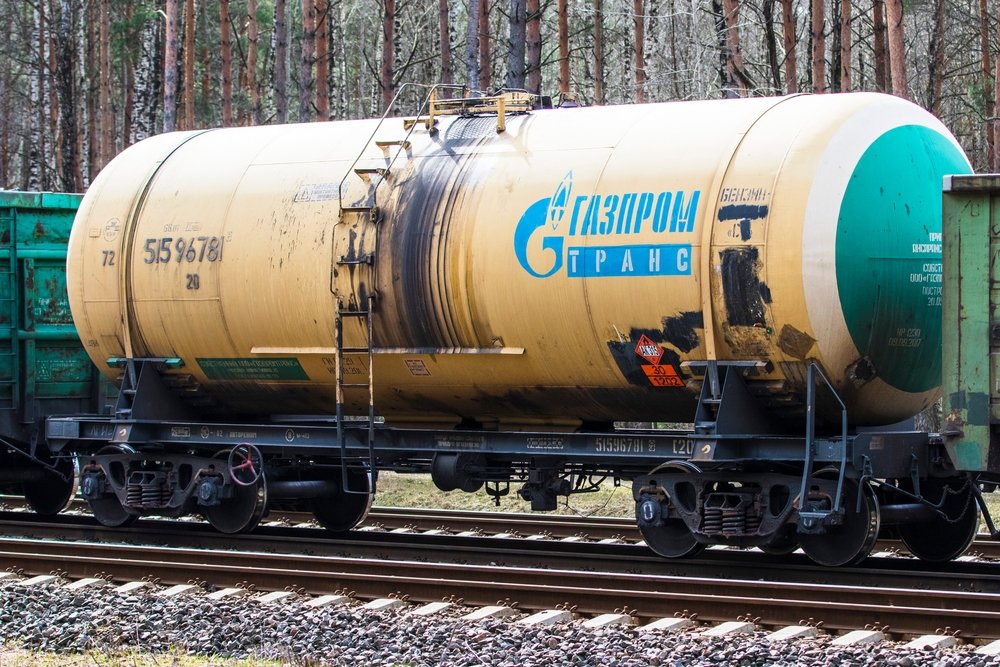 Railway cars featuring the logo of the large gas producer and supplier Gazprom sit on the tracks in Vilnius, Lithuania, June 4, 2021. (Shutterstock Photo)