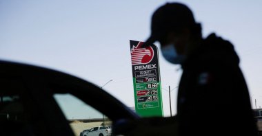 A sign of Mexican state oil company Petroleos Mexicanos (PEMEX) shows their prices of the gasoline at a service station after Mexico suspended a week of gasoline subsidy along the U.S. border, in Ciudad Juarez, Mexico, April 2, 2022. (Reuters Photo)
