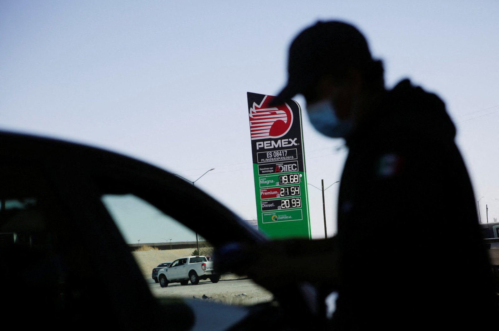A sign of Mexican state oil company Petroleos Mexicanos (PEMEX) shows their prices of the gasoline at a service station after Mexico suspended a week of gasoline subsidy along the U.S. border, in Ciudad Juarez, Mexico, April 2, 2022. (Reuters Photo)