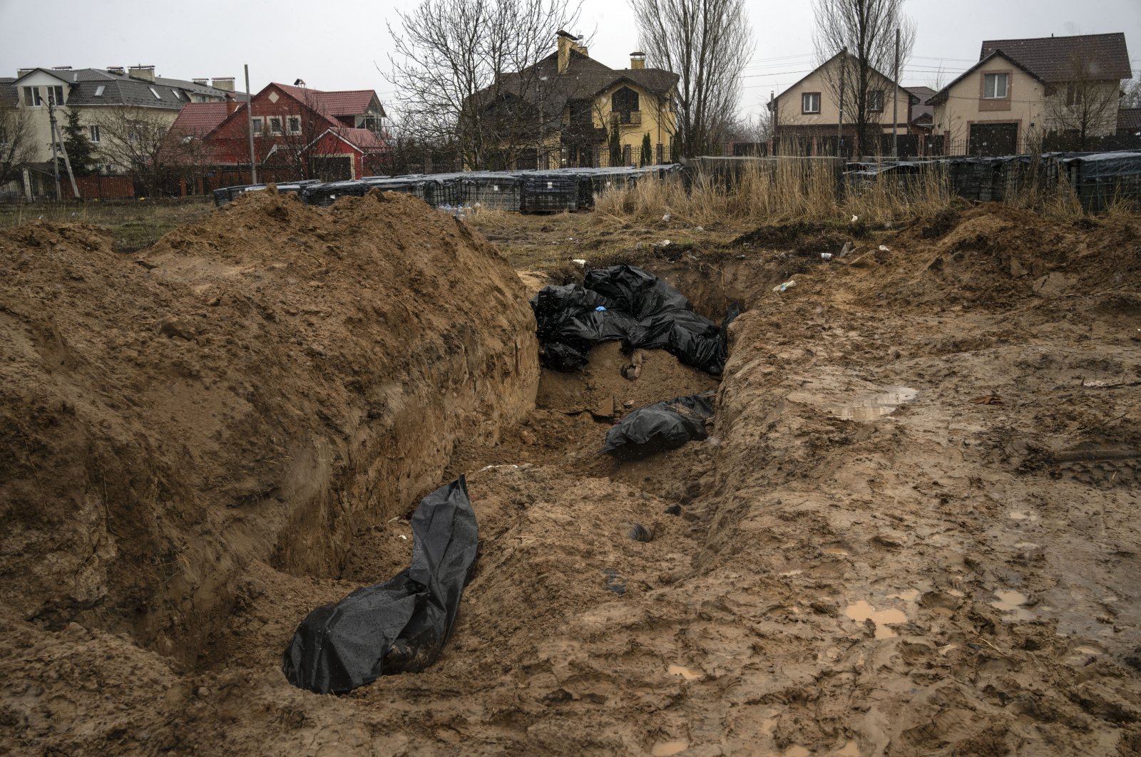 A mass grave in Bucha, on the outskirts of Kyiv, Ukraine, Sunday, April 3, 2022.  (AP Photo)
