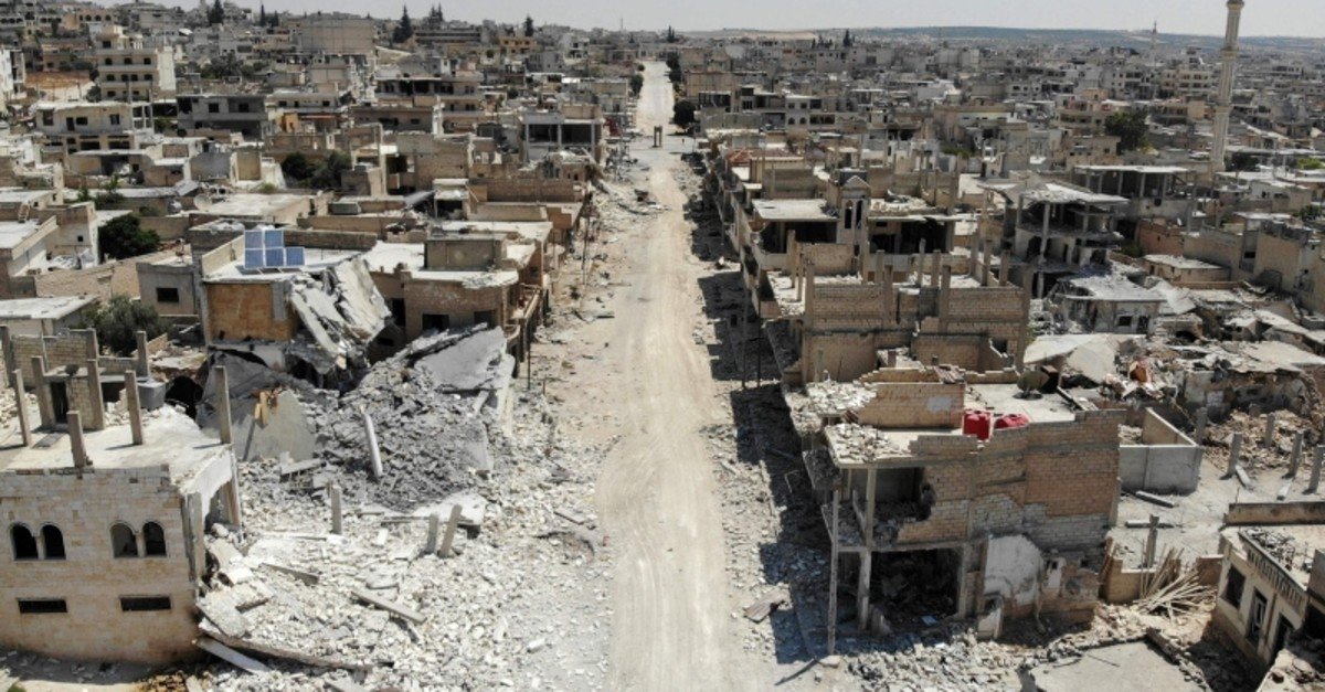 A view of destroyed buildings in the town of Khan Sheikhoun in the southern countryside of the northwestern province of Idlib, Syria, Aug. 3, 2019. (AFP Photo)