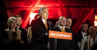 Hungarian Prime Minister Viktor Orban (C) delivers a speech during the governing Fidesz-KDNP party's event after the general election and national referendum on the child protection law in Budapest, Hungary, April 3, 2022. (Hungarian Prime Minister's Office / Handout via EPA)