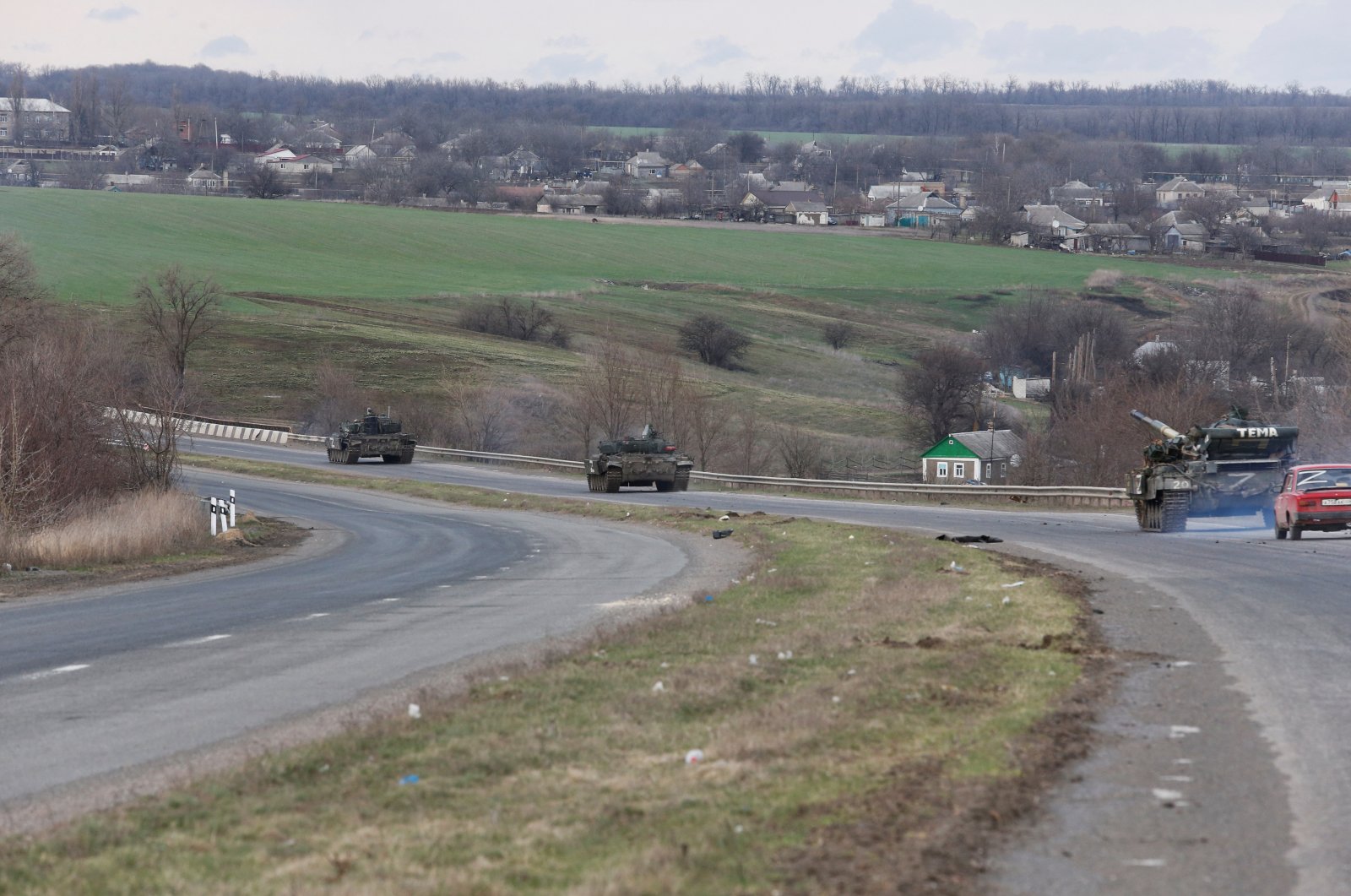 A view shows an armored convoy of pro-Russian troops during the Ukraine-Russia conflict on a road near the southern port city of Mariupol, Ukraine, April 3, 2022. (Reuters Photo)