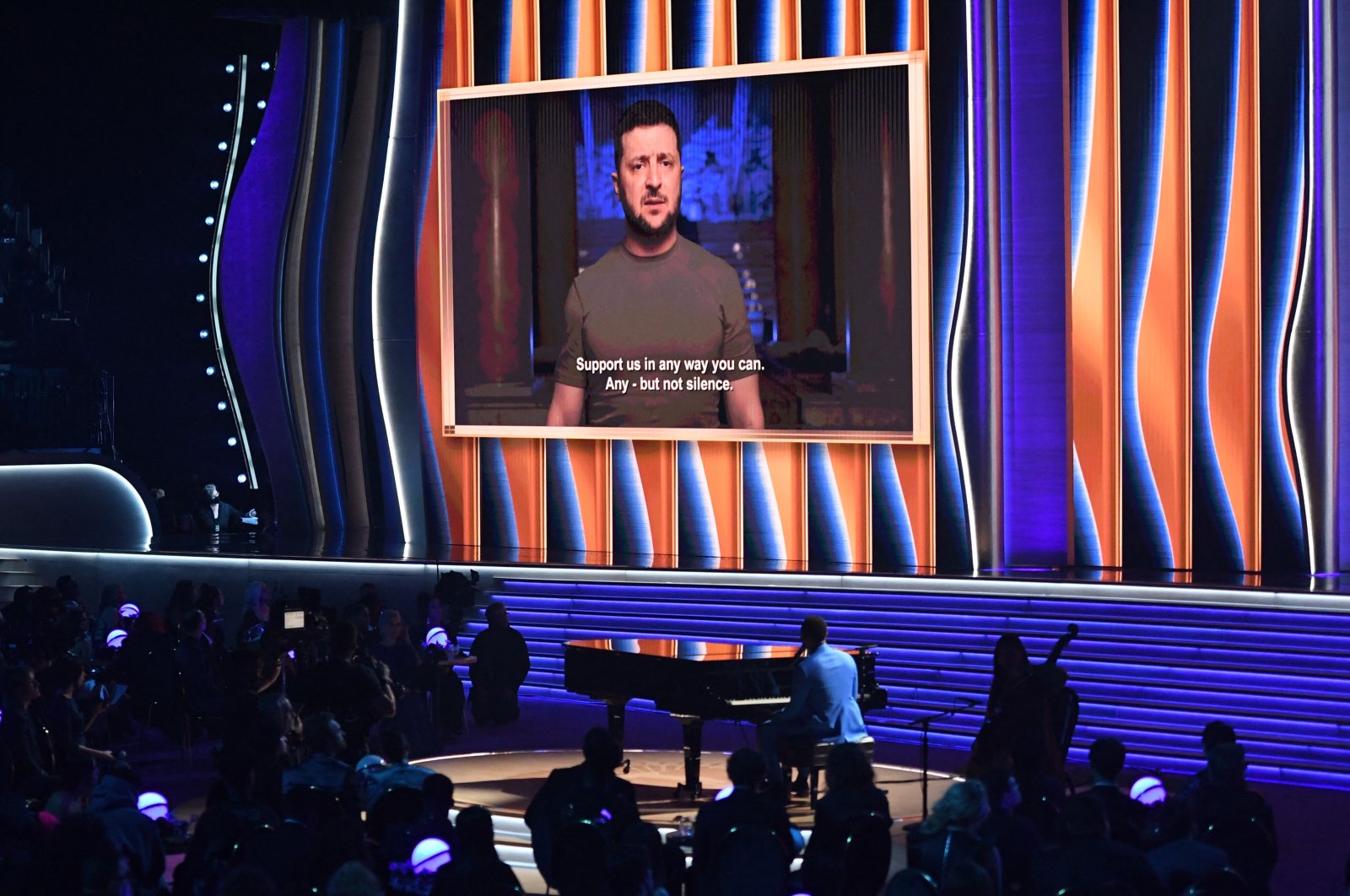 Ukraine&#039;s President Volodymyr Zelenskyy appears on screen during the 64th Annual Grammy Awards at the MGM Grand Garden Arena in Las Vegas, U.S., April 3, 2022. (AFP Photo)
