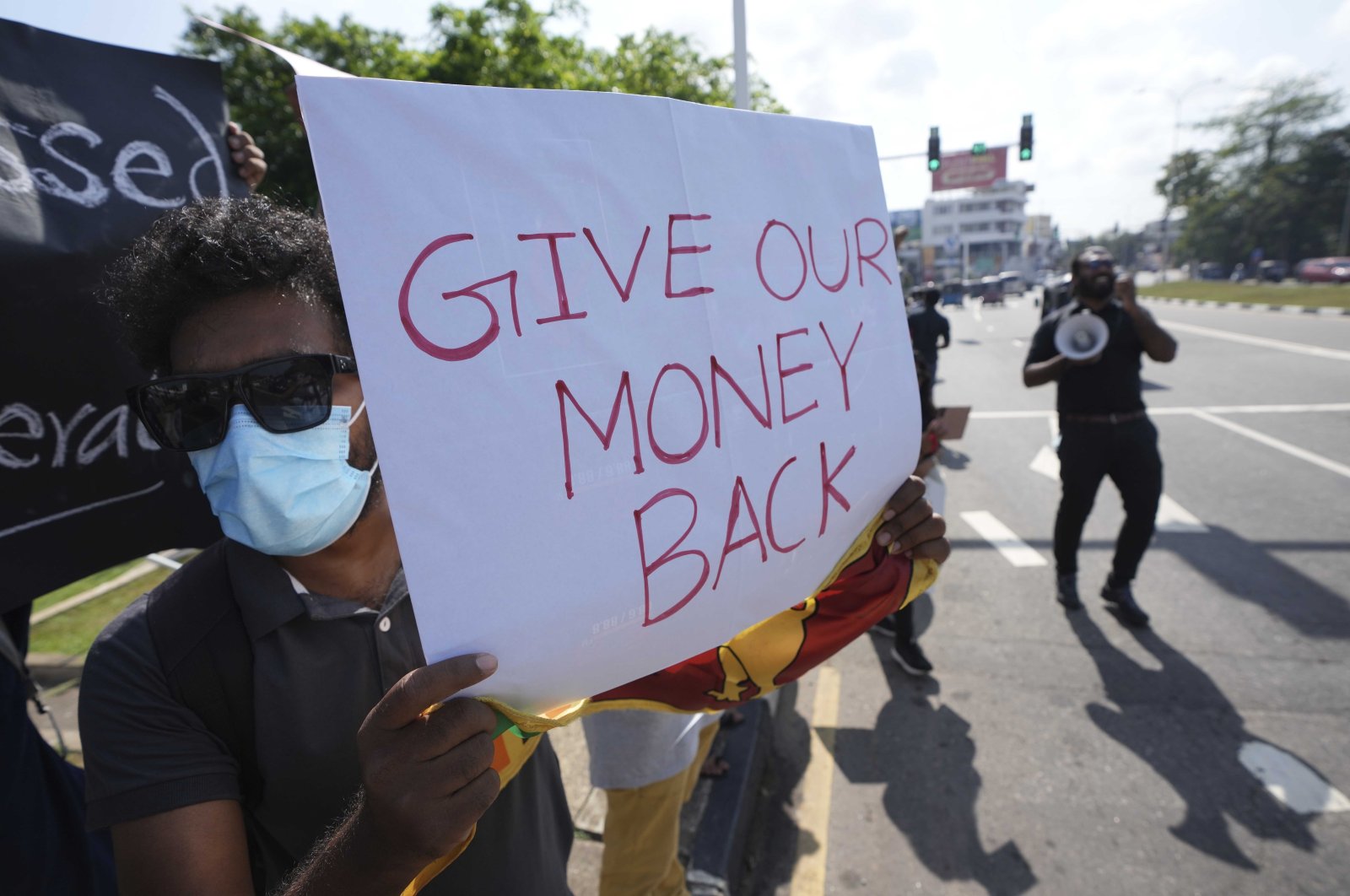 Sri Lankans protest demanding President Gotabaya Rajapaksa resign in Colombo, Sri Lanka, April 4, 2022. (AP Photo)