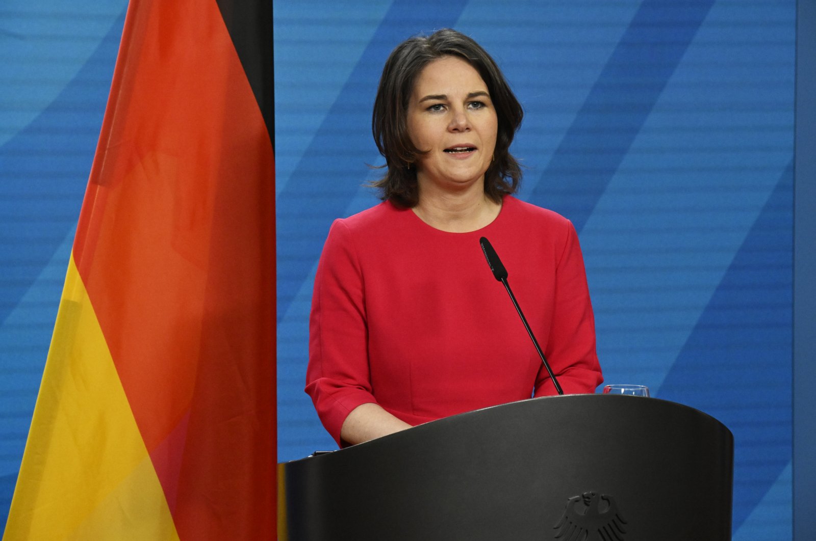 German Foreign Minister Annalena Baerbock speaks during a joint press statement with Singapore's Minister of Foreign Affairs Vivian Balakrishnan in the Foreign Office in Berlin, Germany, Monday April 4, 2022. (Tobias Schwarz/Pool via AP)