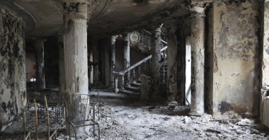 Debris covers the inside of the Mariupol theater damaged by Russian attacks in Mariupol, eastern Ukraine, April 4, 2022. (AP Photo)