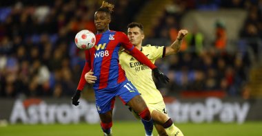 Crystal Palace&#039;s Wilfried Zaha in action with Arsenal&#039;s Granit Xhaka during a Premier League match, London, England, April 4, 2022. (Reuters Photo)