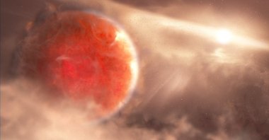 An artist's illustration shows a massive, newly forming exoplanet called AB Aurigae b, estimated to be about nine times more massive than Jupiter that orbits its host star over two times farther than Pluto is from our sun. (Reuters Photo)