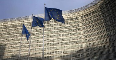 Flags of the European Union can be seen fluttering outside the European commission headquarters in Brussels, Belgium, Dec. 25, 2020. (AFP Photo)