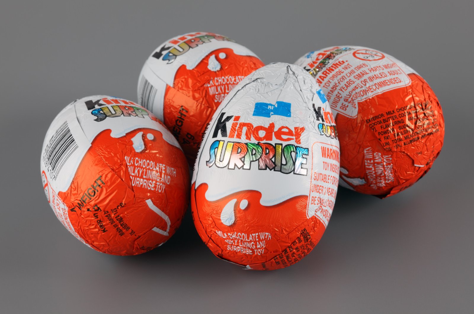 Four Kinder Surprise eggs are shown on a gray background in this illustration photo taken on April 4, 2013. (Alamy via Reuters)