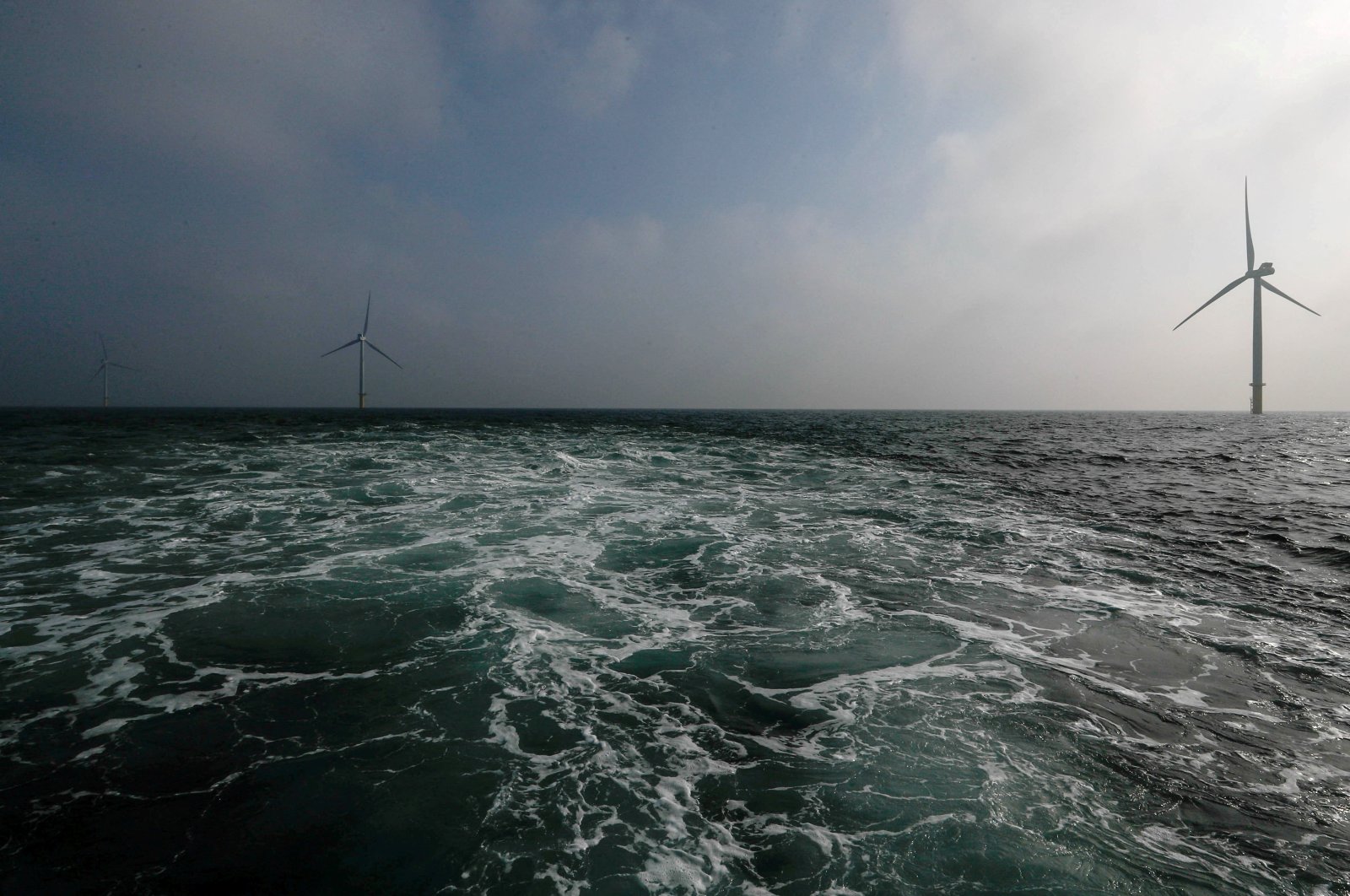 Power-generating windmill turbines are seen at the Eneco Luchterduinen offshore wind farm near Amsterdam, the Netherlands, Sept. 26, 2017. (Reuters Photo)