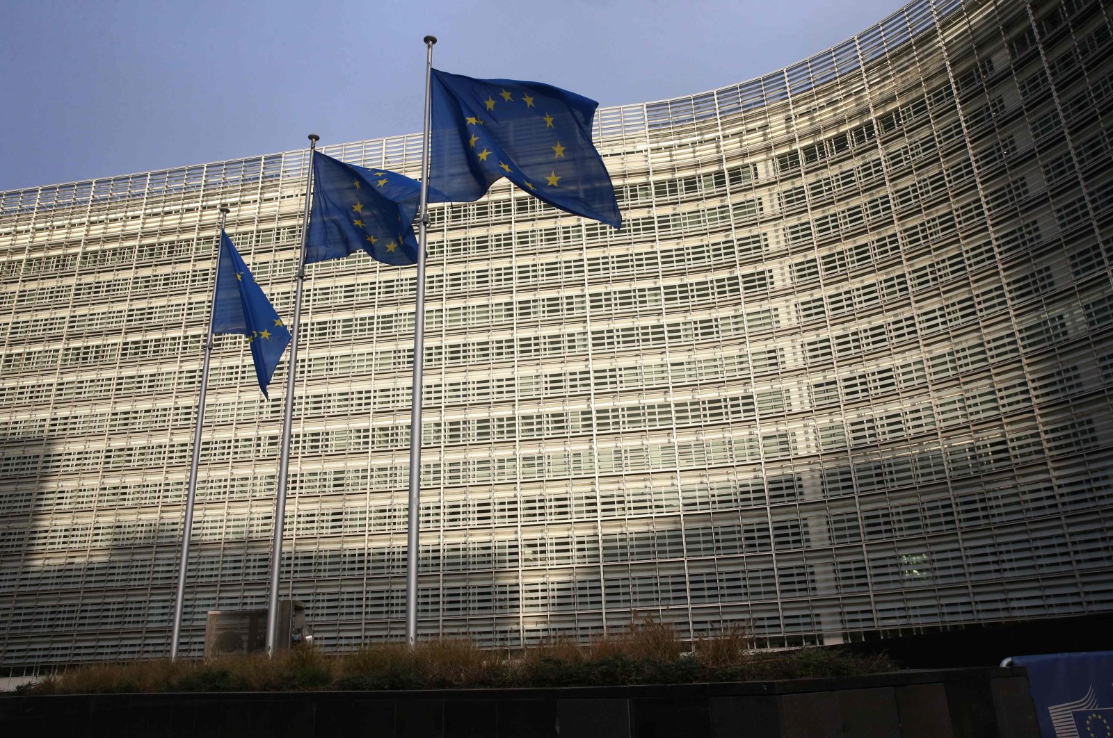 Flags of the European Union can be seen fluttering outside the European commission headquarters in Brussels, Belgium, Dec. 25, 2020. (AFP Photo)