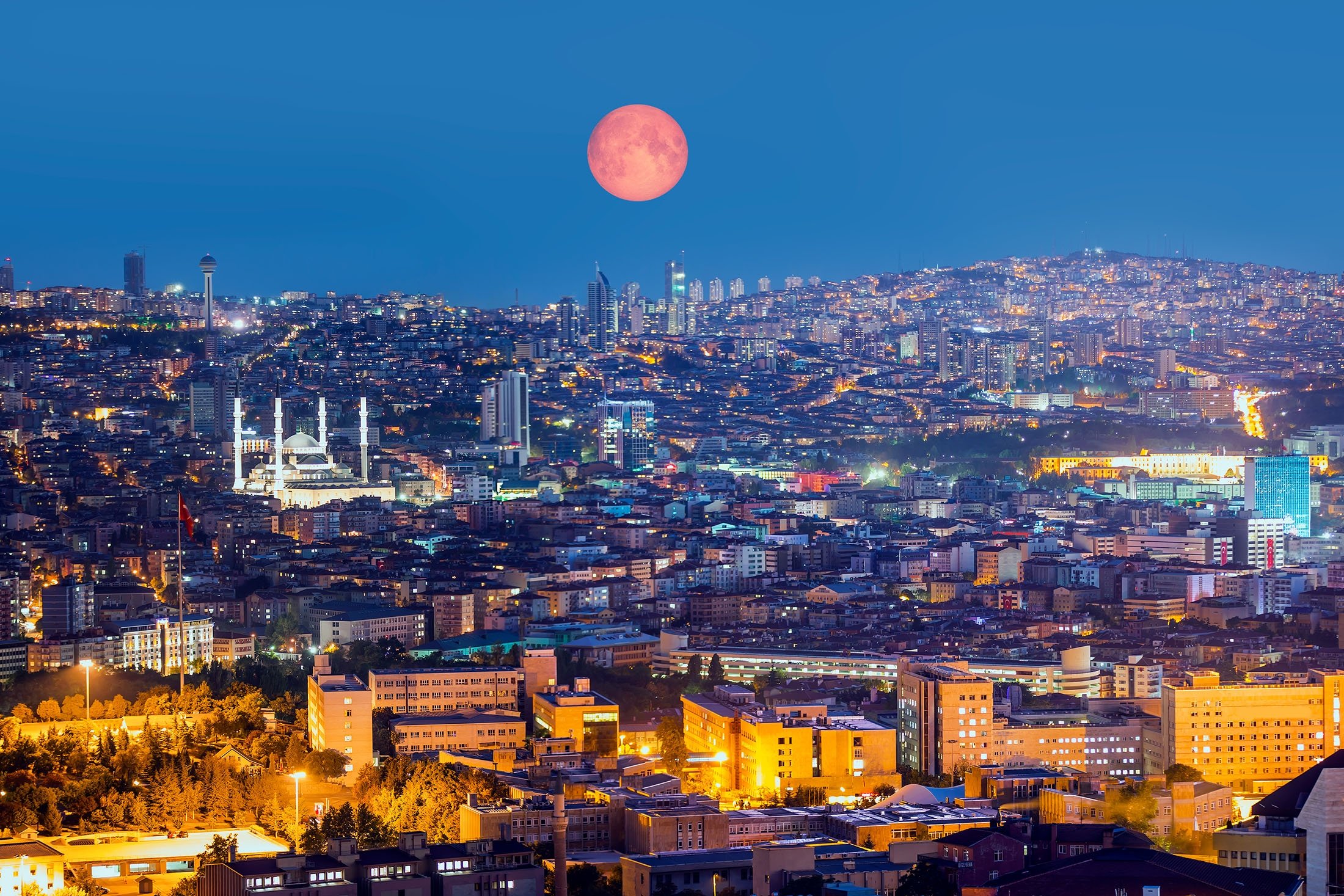Moon rises upon the capital Ankara, Turkey. (Shutterstock Photo)