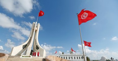 Members of the honor guard stand at attention during a flag-raising in place of Kasba in Tunis, Tunisia, June 26, 2018. (Reuters File Photo)