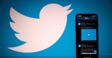 The logo of U.S. social network Twitter is displayed on the screen of a smartphone and a tablet in Toulouse, southern France, Oct. 26, 2020. (AFP Photo)