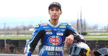 Superbike world champion Razgatlıoğlu poses for a photo in Istanbul, Turkey, March 31, 2022. (IHA Photo)