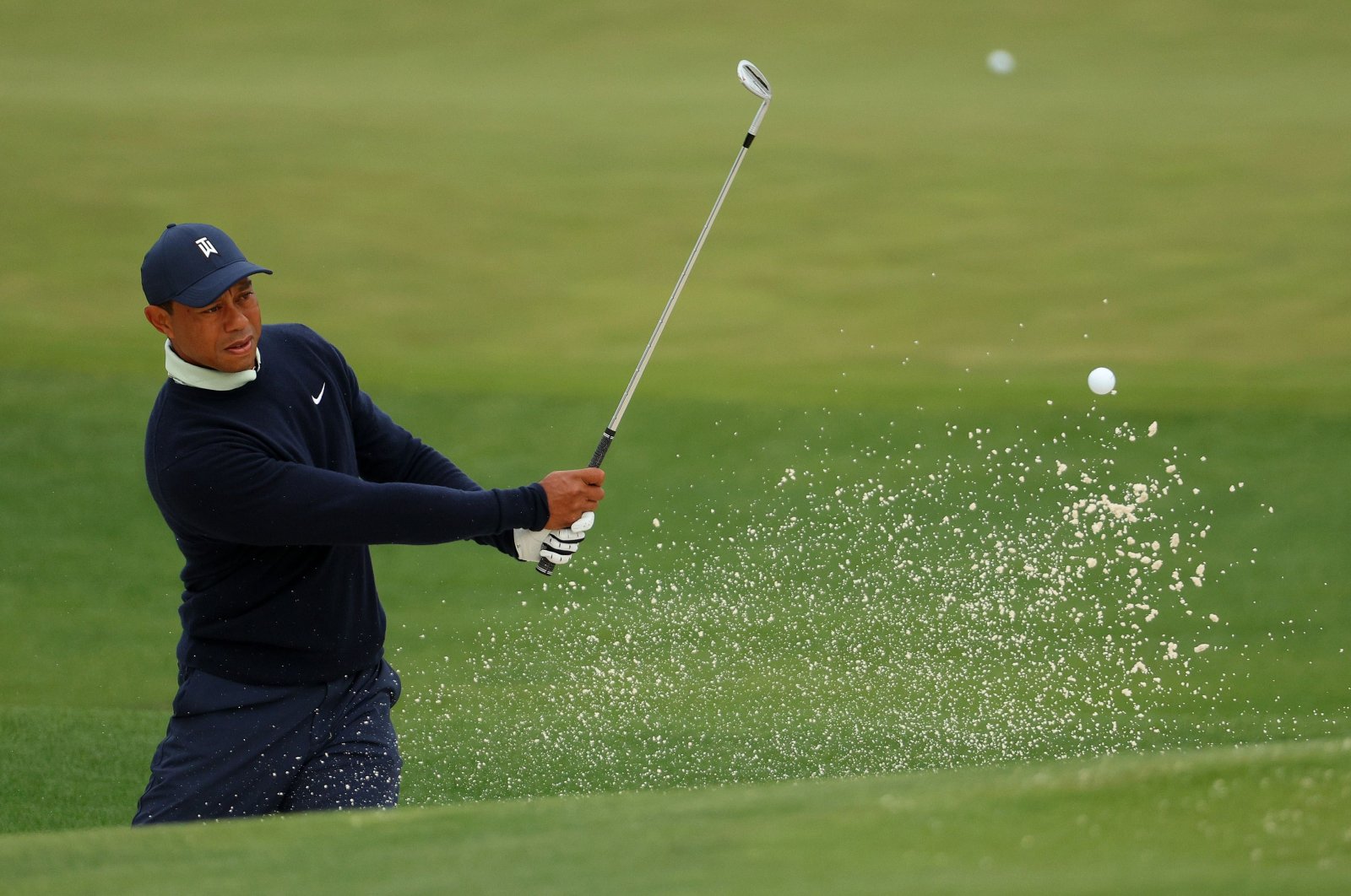 Tiger Woods warms up during a practice round prior to the Masters at Augusta National Golf Club, Augusta, Georgia, U.S., April 05, 2022. (AFP Photo)