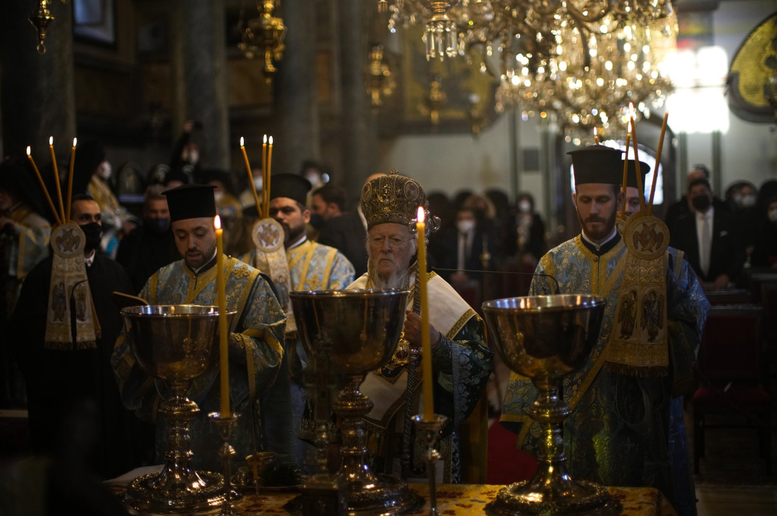 Ecumenical Patriarch Bartholomew I (C), the spiritual leader of the world's Orthodox Christians, leads the Epiphany Mass at the Patriarchal Church of St. George in Istanbul, Turkey, Jan. 6, 2022. (AP File Photo)