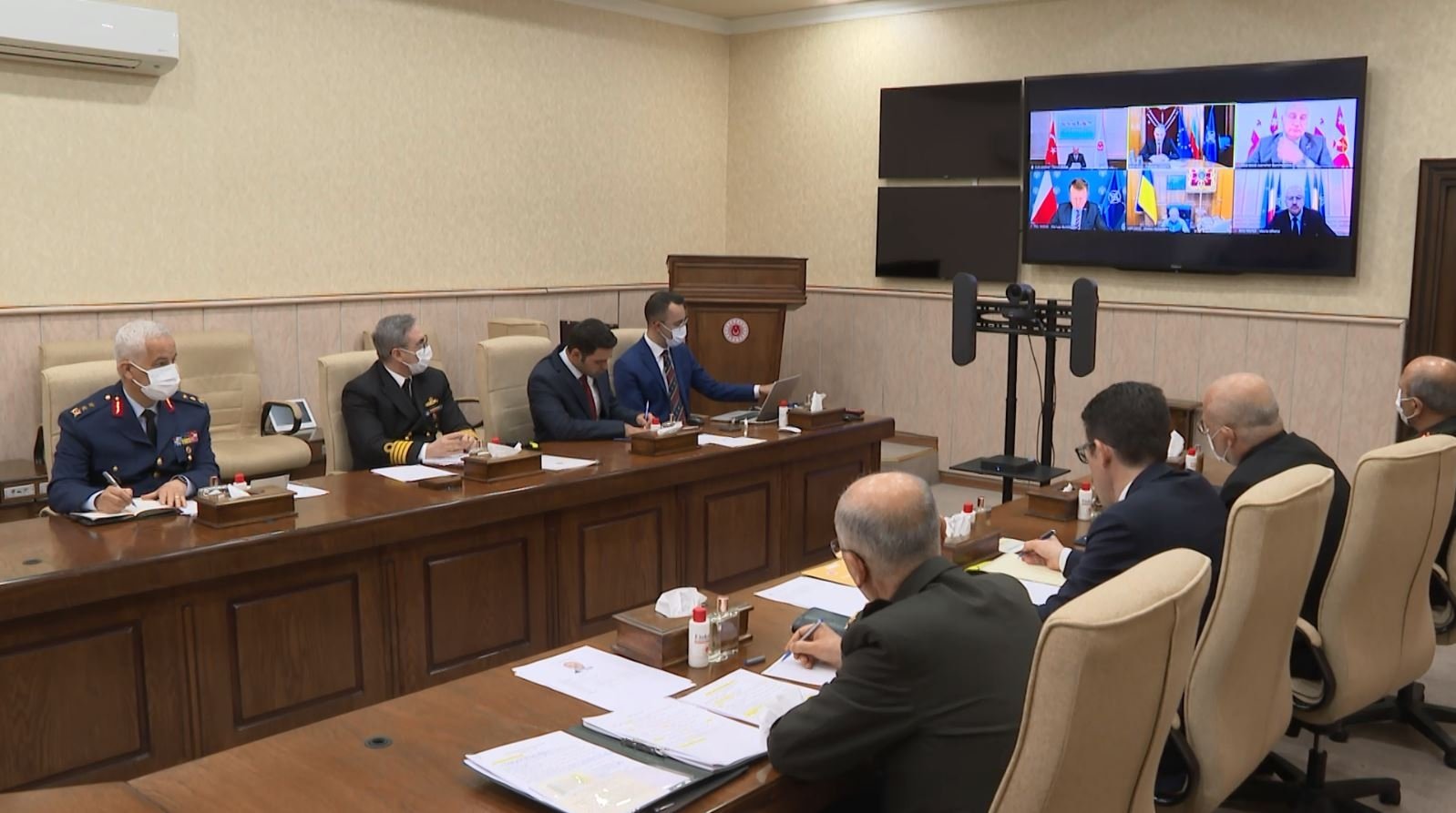 Defense Minister Hulusi Akar attends a videoconference with counterparts from Poland, Ukraine, Georgia, Bulgaria and Romania, April 7, 2022. (AA Photo)