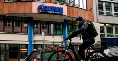A cyclist passes in front of Gazprom&#039;s headquarters in Berlin, Germany, April 5, 2022. (EPA Photo)