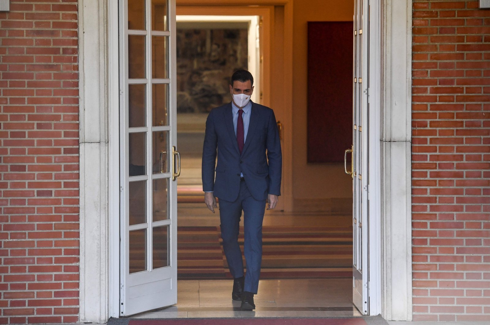 Spain&#039;s Prime Minister Pedro Sanchez arrives to welcome the newly elected president of the right-wing Popular Party (PP) before a meeting at La Moncloa palace in Madrid, Spain, April 7, 2022. (AFP Photo)
