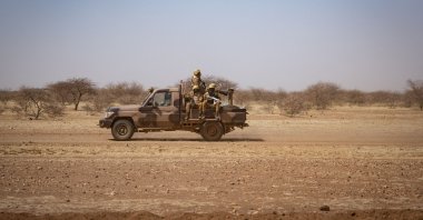 Burkina Faso soldiers patrol aboard a pick-up truck along the road from Dori to the Goudebo refugee camp, Burkina Faso, Feb. 3, 2020. (AFP File Photo)