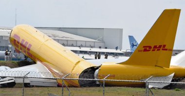 A DHL cargo plane is seen after an emergency landing at the Juan Santa Maria International Airport due to a mechanical problem, Alajuela, Costa Rica, April 7, 2022. (AFP Photo)