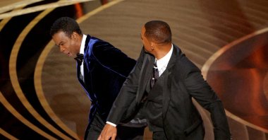 Will Smith (R) slaps Chris Rock as Rock spoke on stage during the 94th Academy Awards in Hollywood, Los Angeles, California, U.S., March 27, 2022. (Reuters File Photo)