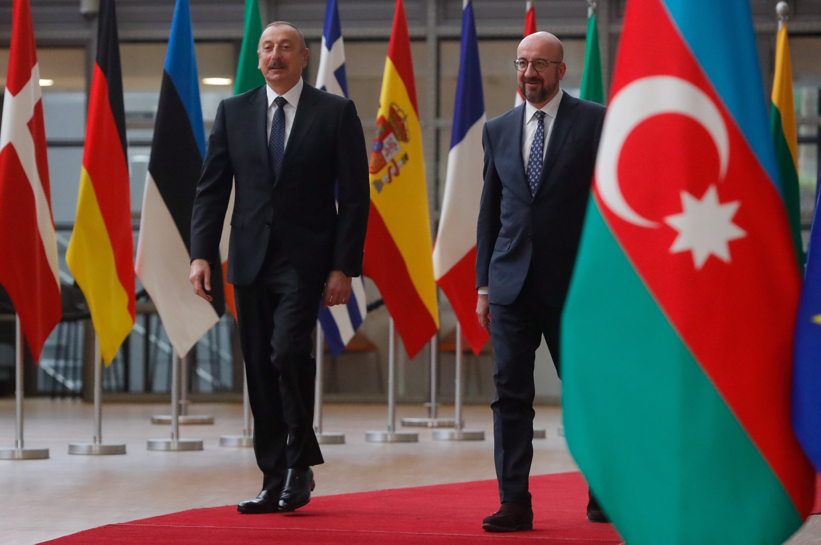 Azerbaijani President Ilham Aliyev (L) is welcomed by European Council President Charles Michel (R) ahead of a meeting at the European Council in Brussels, Belgium, April 6, 2022.  (EPA Photo)