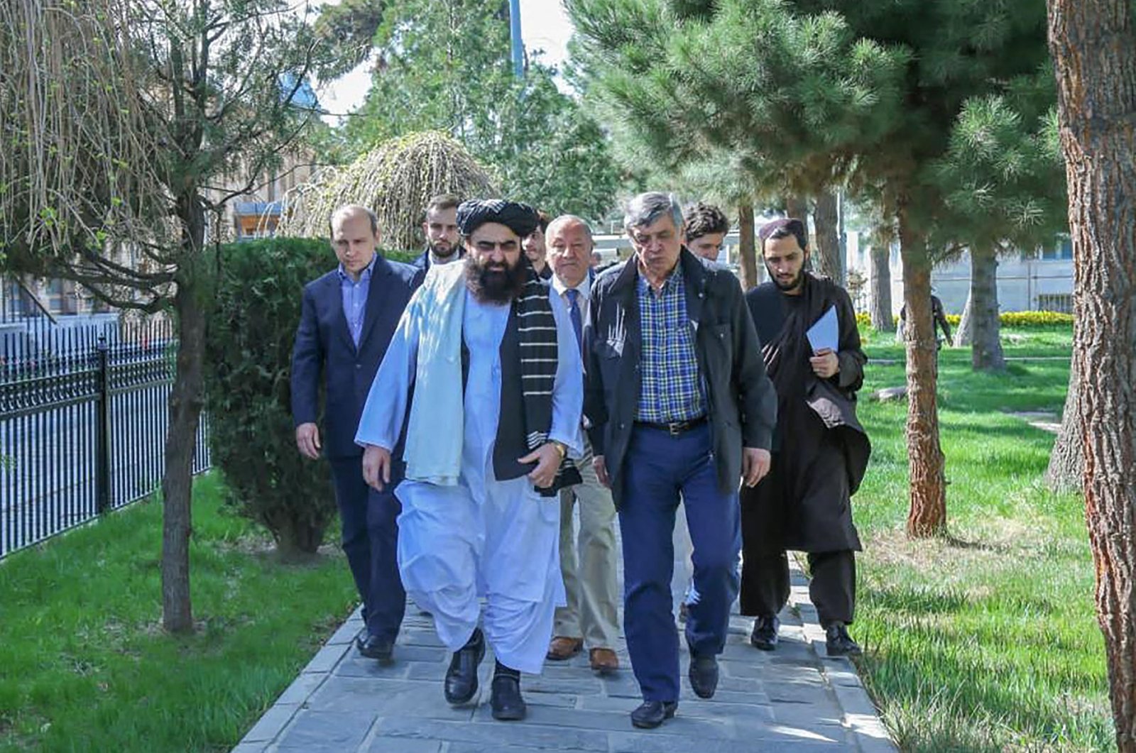 This handout photo released by the Taliban Foreign Ministry shows Taliban Foreign Minister Amir Khan Muttaqi (2L) and Kremlin&#039;s special envoy to Afghanistan, Zamir Kabulov (2R) walking before their meeting in Kabul, Afganistan, March 24, 2022. (Photo by Taliban Foreign Ministry/AFP)