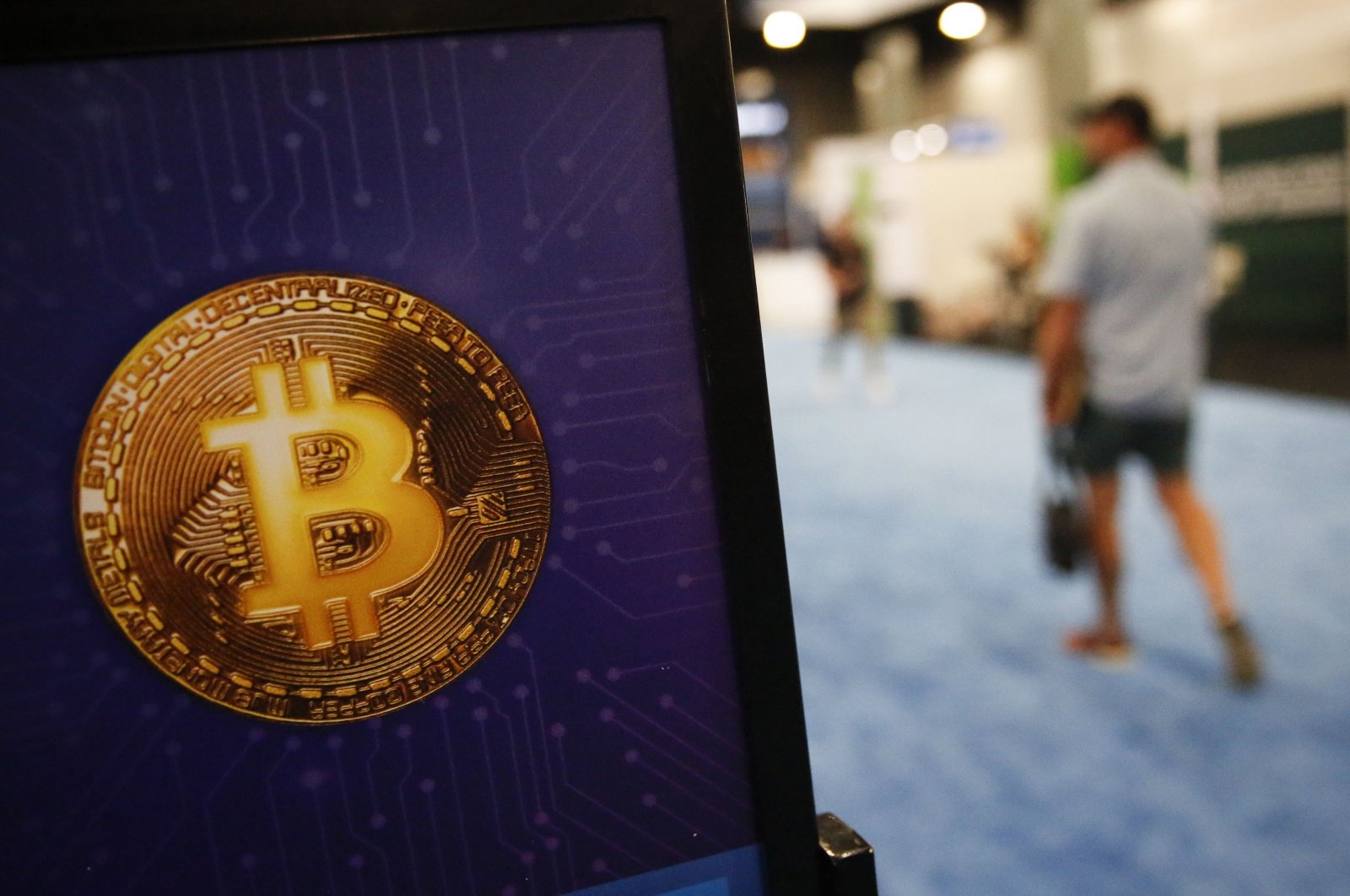 A bitcoin logo is seen during the Bitcoin 2022 Conference at Miami Beach Convention Center in Miami, Florida, U.S., April 8, 2022. (AFP Photo)
