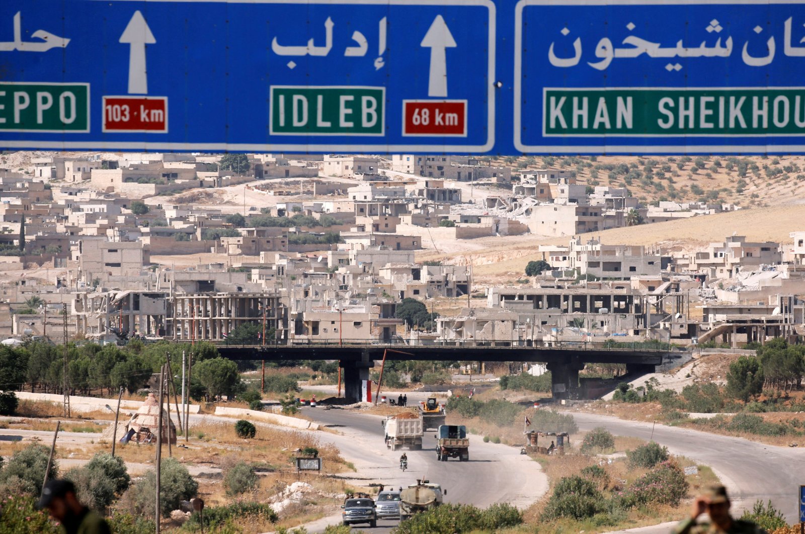 Road direction signs are pictured at the entrance enroute to the town of Khan Sheikhoun, Syria, Aug. 24, 2019. (REUTERS Photo)