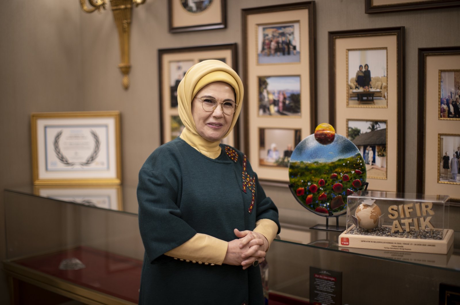 First lady Emine Erdoğan poses next to the logo of the Zero Waste Project made of organic materials, in the capital Ankara, Turkey, April 9, 2022. (AA PHOTO)