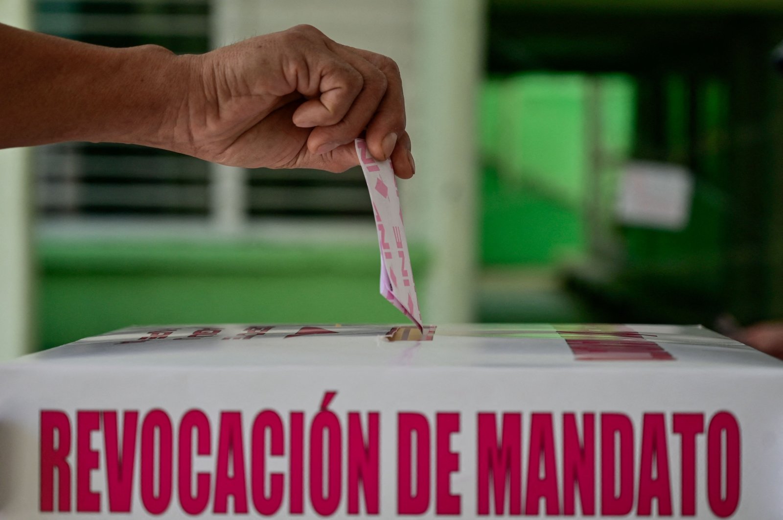 A man casts his vote at a polling station during a national referendum on the revocation of the mandate of Mexican President Andres Manuel Lopez Obrador, Mexico City, Mexico, April 10, 2022. (AFP Photo)