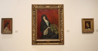 &quot;Woman with Mimosa&quot; at the MSGSÜ exhibition in Istanbul Painting and Sculpture Museum.