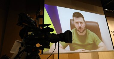 Ukrainian President Volodymyr Zelenskyy addresses the South Korean parliament via video link at the national assembly in Seoul, South Korea, April 11, 2022. (AFP Photo)