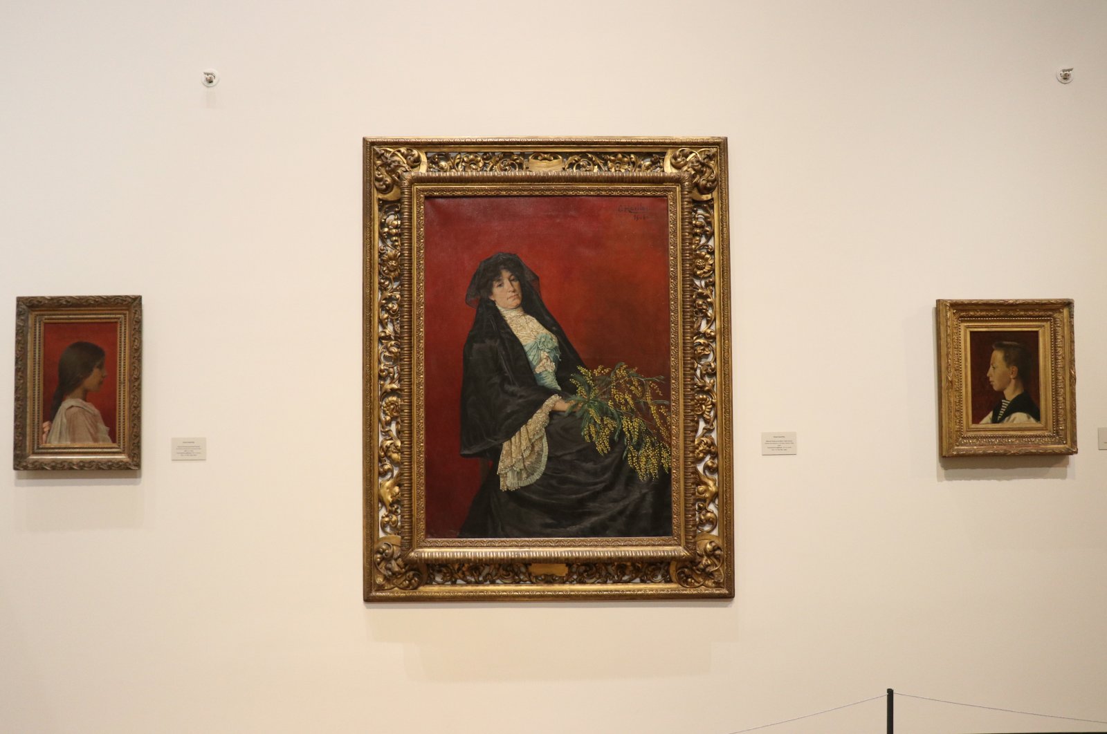 &quot;Woman with Mimosa&quot; at the MSGSÜ exhibition in Istanbul Painting and Sculpture Museum.