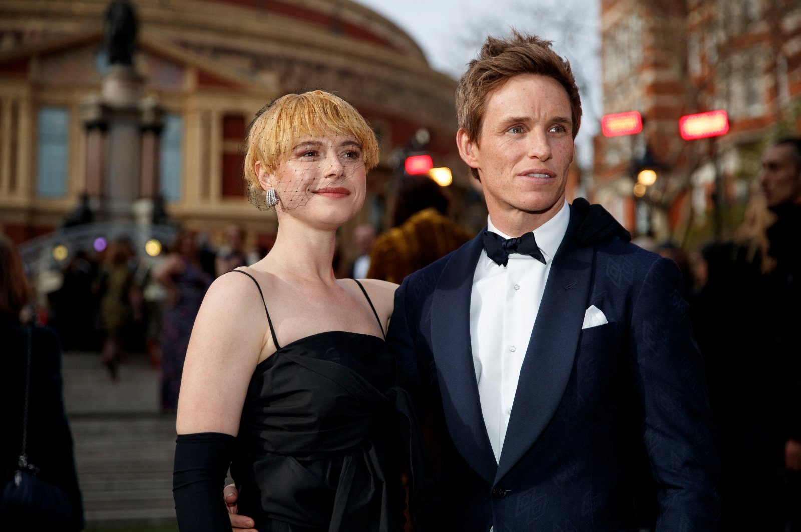 Actors Jessie Buckley and Eddie Redmayne from &quot;Cabaret&quot; arrive at the Olivier Awards in the Royal Albert Hall in London, Britain, April 10, 2022. (Reuters Photo)