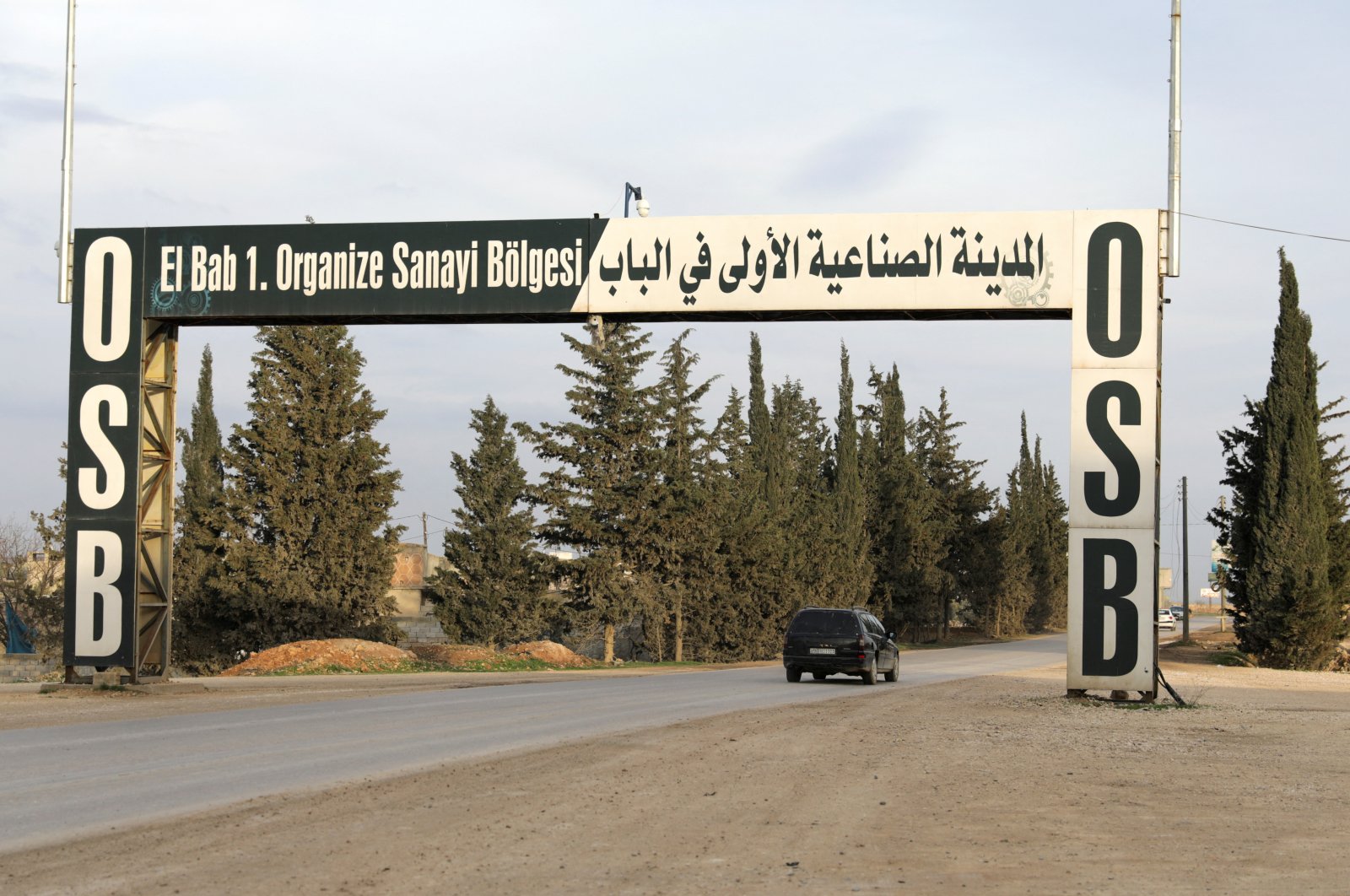 A car drives at the entrance of the industrial zone of Syria&#039;s city of al-Bab, Syria March 8, 2022. (Reuters Photo)