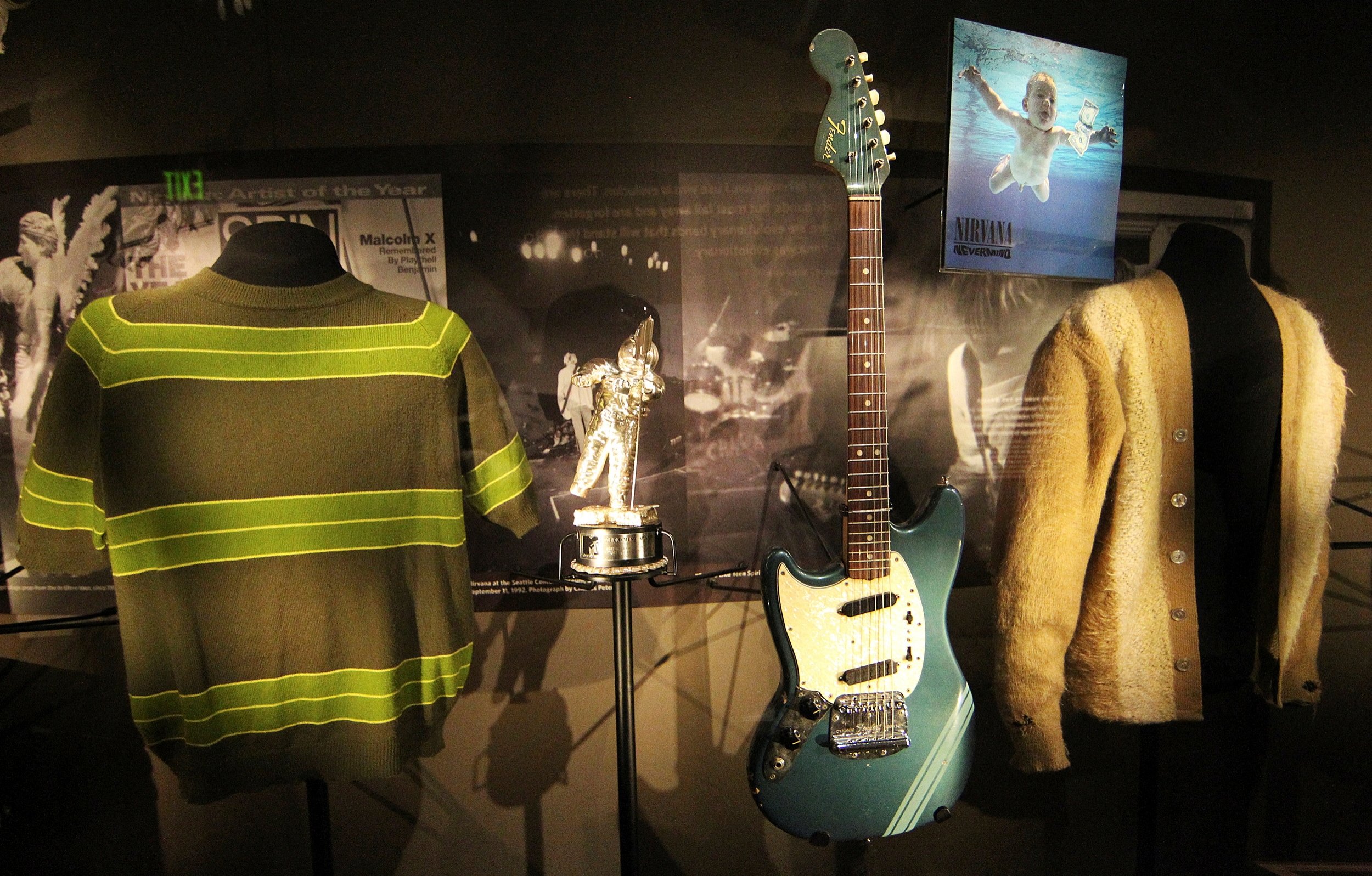 Memorabilia including iconic clothing and musical instruments of the late Kurt Cobain of the legendary grunge band Nirvana, on display at the 