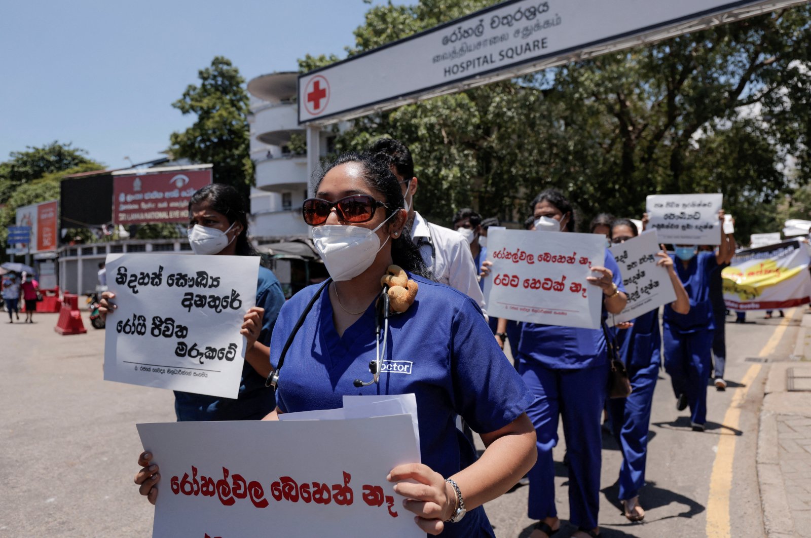 Government Medical Officers; Association members walk with placards protesting against Sri Lankan President Gotabaya Rajapaksa after his government lost its majority in parliament during a demonstration near the parliament building in Colombo, Sri Lanka, April 6, 2022. (Reuters Photo)