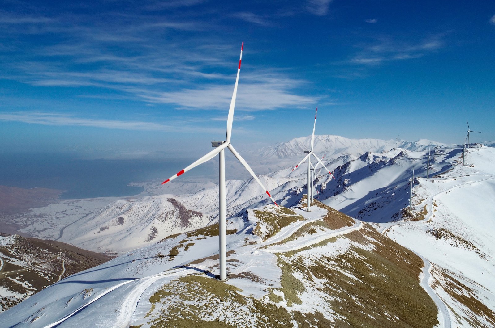 Wind turbines are seen in the Gevaş district of eastern Van province, Turkey, Feb. 24, 2022. (AA Photo)