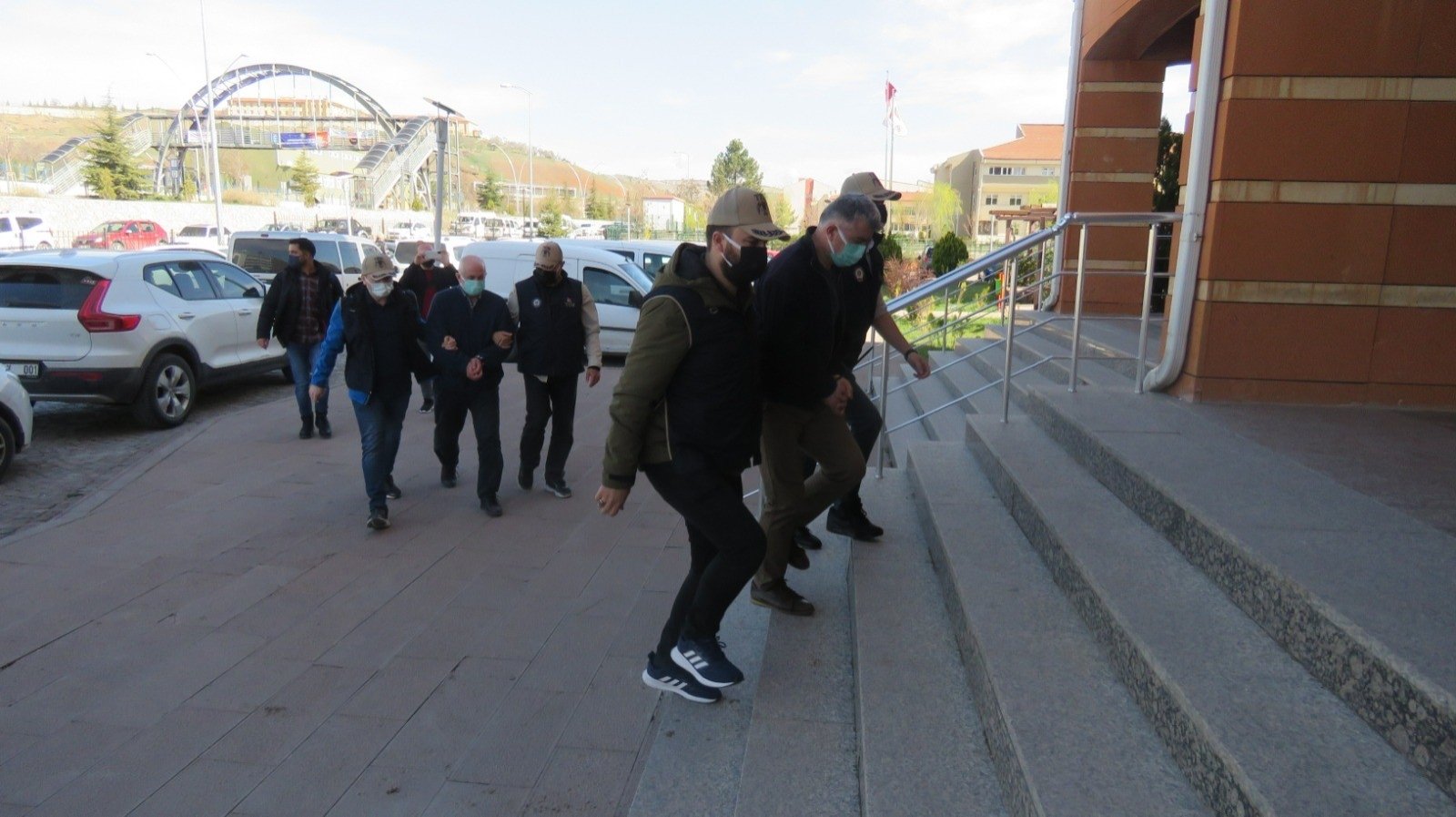 Police escort captured FETÖ suspects, in Çankırı, central Turkey, April 13, 2022. (İHA PHOTO)