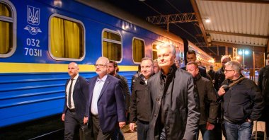 Latvian President Egils Levits (2nd L), Polish President Andrzej Duda (C) and Lithuanian President Gitanas Nauseda board a train to Ukraine, amid Russia's invasion, in Rzeszow, Poland, April 13, 2022. (Reuters Photo)